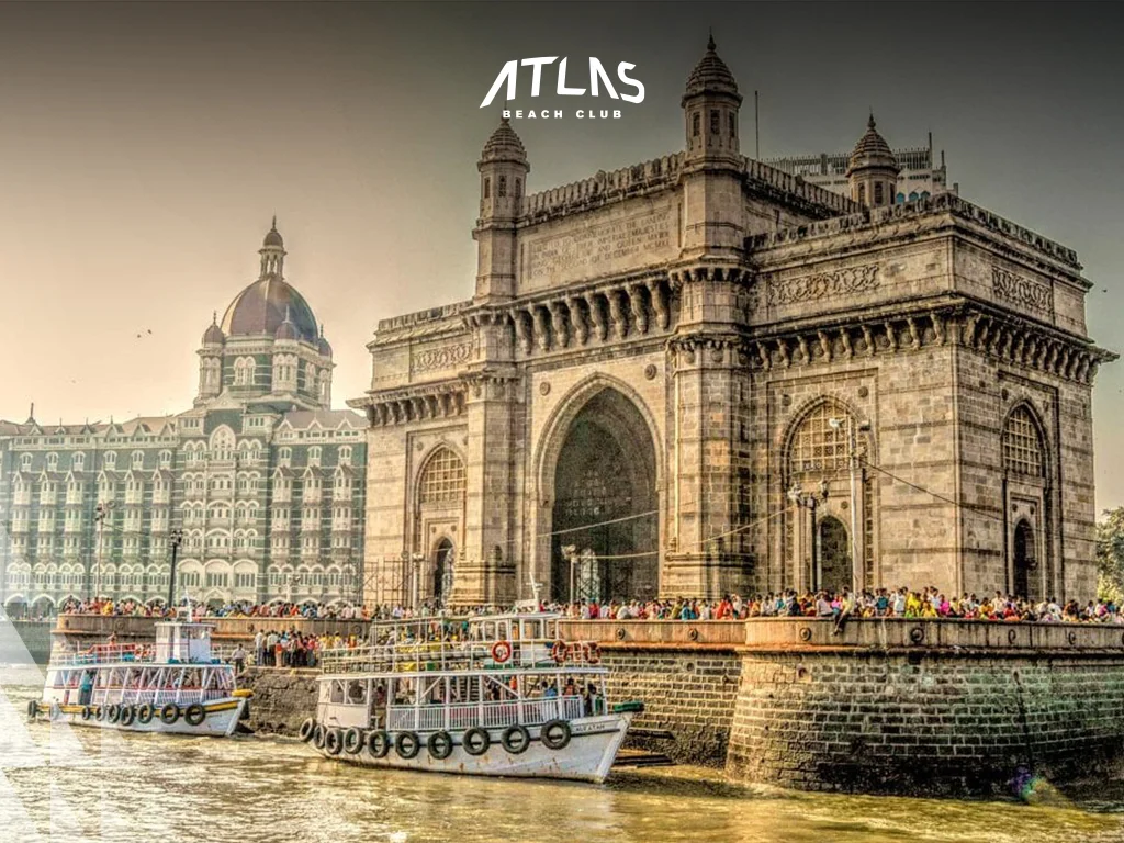 Gateway of India in Mumbai with tourists and vibrant atmosphere.